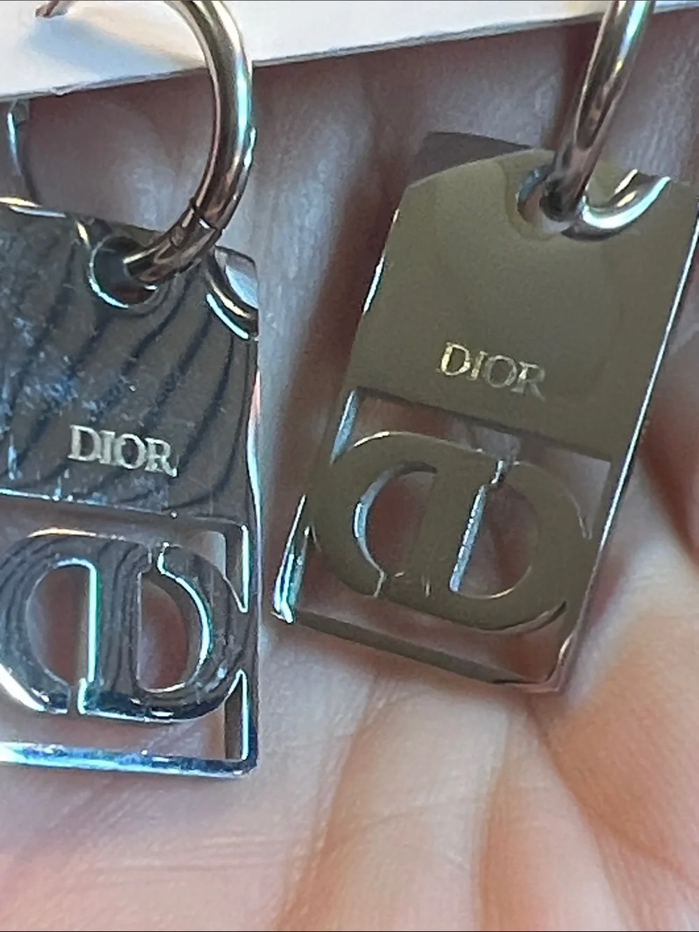 Silver-Tone Earrings with Pink Logo Accent